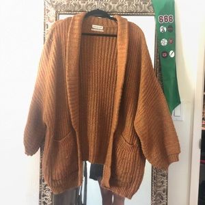 Oversized orange and green knitted cardigan